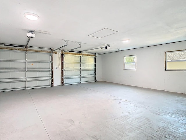 garage featuring a garage door opener