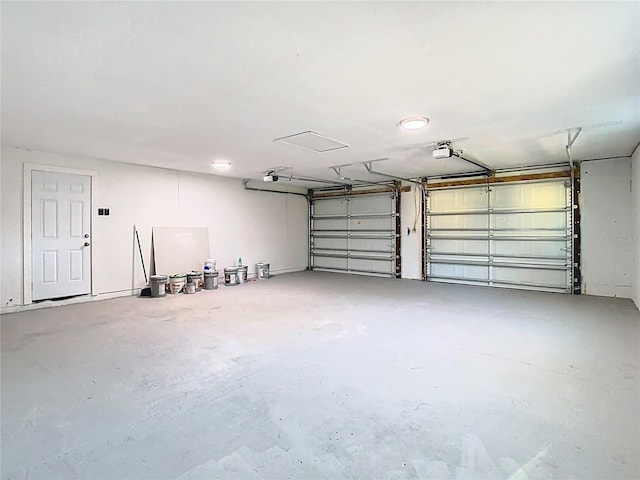 garage featuring a garage door opener