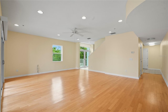 spare room with recessed lighting, visible vents, light wood-style floors, and ceiling fan