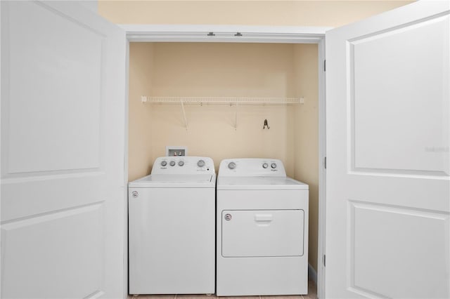 laundry area with laundry area and washer and dryer