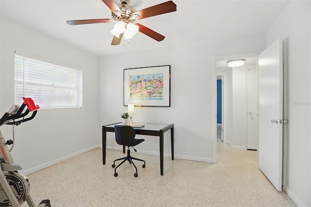 1005 Catalpa Ln, Orlando, FL 32806 - office featuring baseboards, a ceiling fan, and light speckled floor