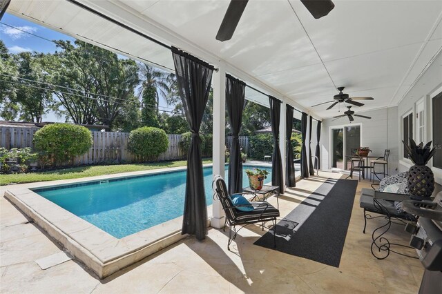 1005 Catalpa Ln, Orlando, FL 32806 - view of pool featuring a patio, a fenced backyard, a fenced in pool, and a ceiling fan