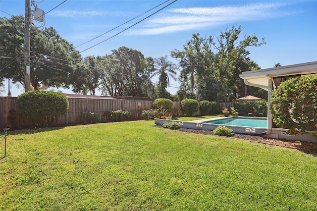 1005 Catalpa Ln, Orlando, FL 32806 - view of yard with a fenced backyard and a fenced in pool