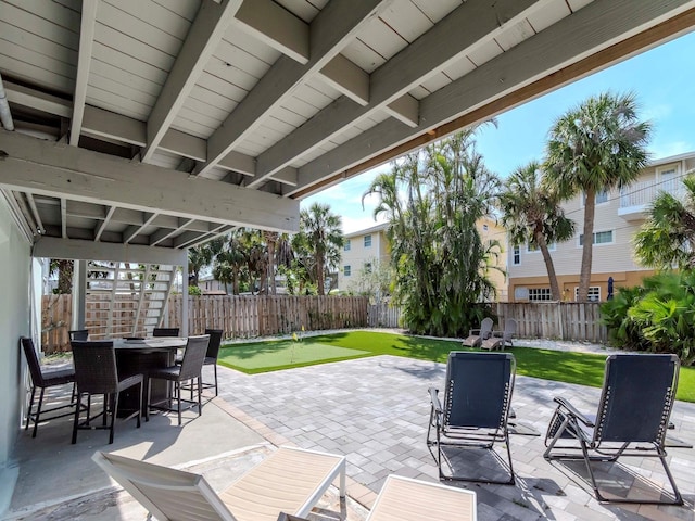 view of patio / terrace featuring outdoor dining area and a fenced backyard