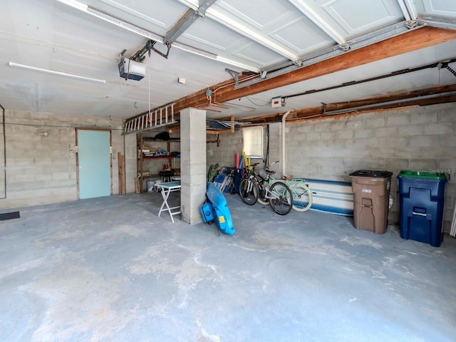 garage featuring a garage door opener