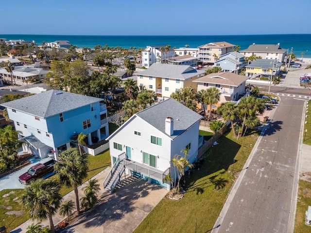 aerial view with a residential view and a water view