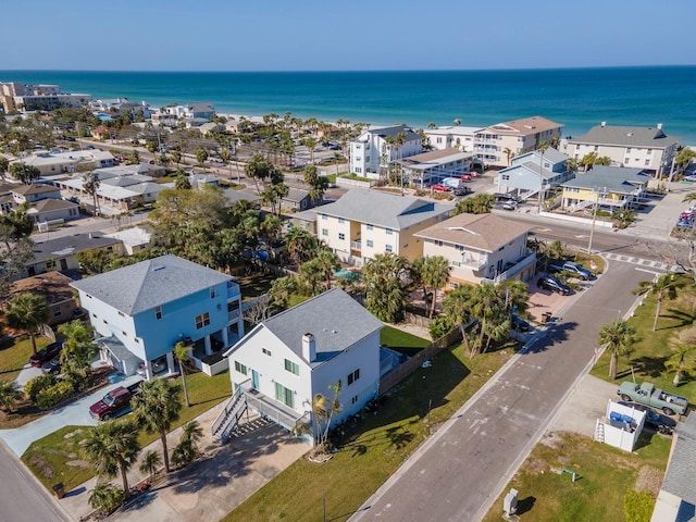 aerial view featuring a residential view and a water view