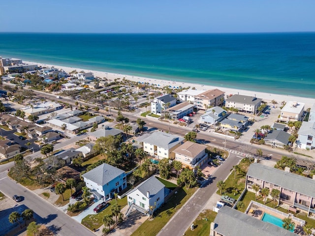 aerial view featuring a water view and a beach view