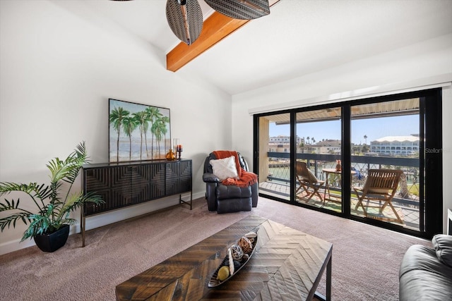 living area featuring baseboards, carpet, and vaulted ceiling with beams