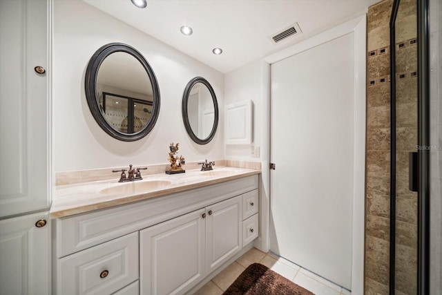 full bath with a sink, visible vents, recessed lighting, and tile patterned flooring