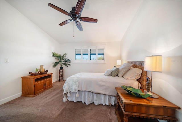 bedroom with baseboards, carpet floors, ceiling fan, and vaulted ceiling