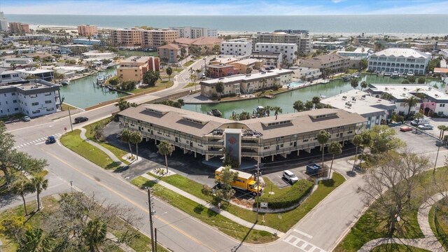 aerial view featuring a water view and a view of city