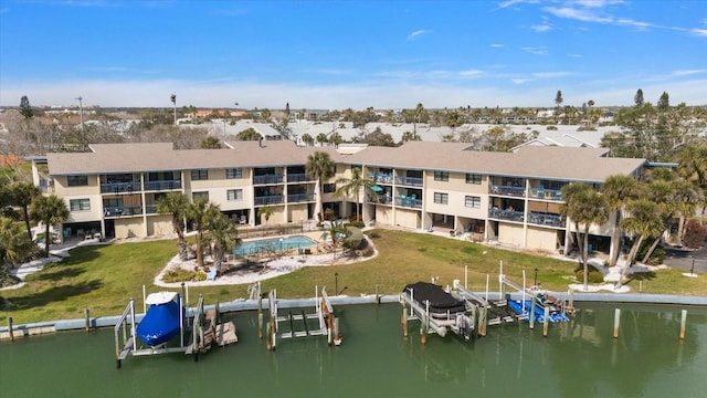 aerial view with a residential view and a water view