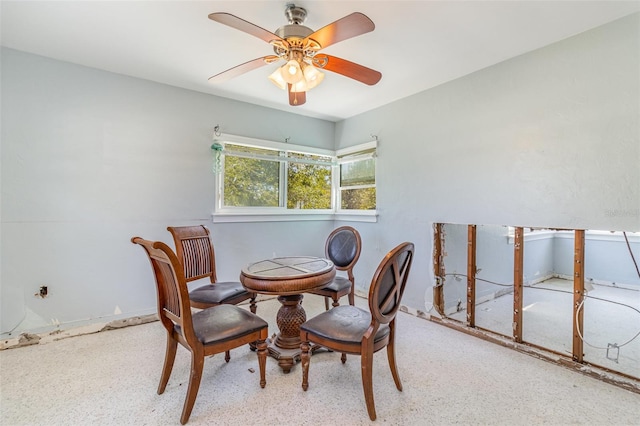 dining area featuring a ceiling fan