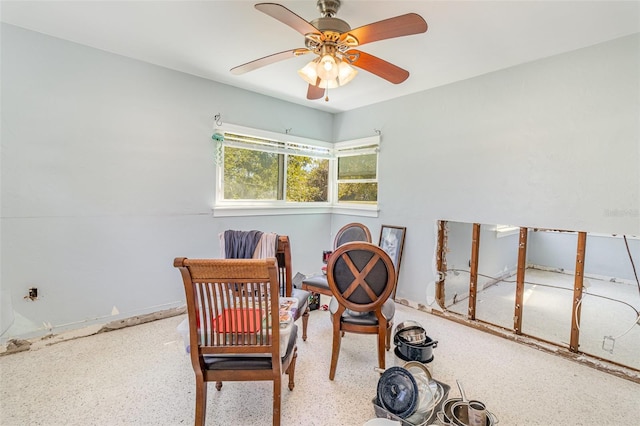 interior space featuring a ceiling fan