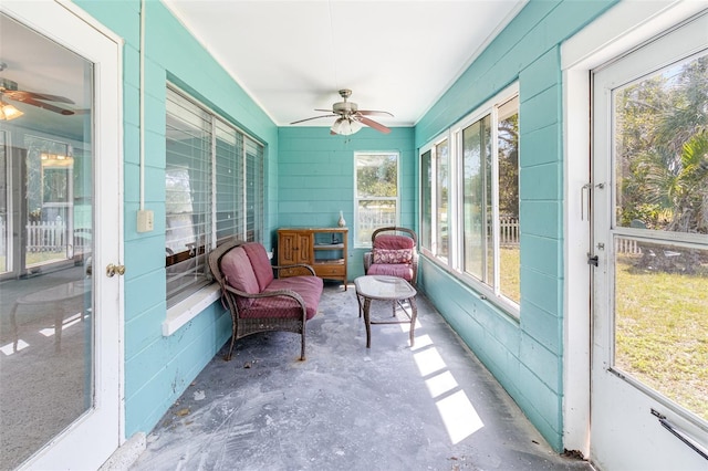 sunroom with a ceiling fan