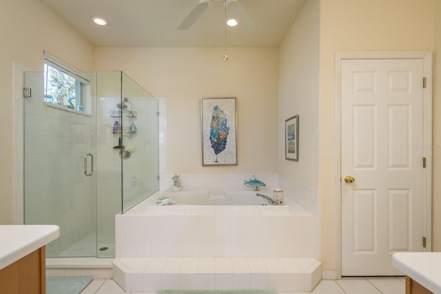 full bathroom with vanity, a stall shower, ceiling fan, tile patterned flooring, and a bath