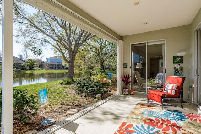 view of patio featuring a water view