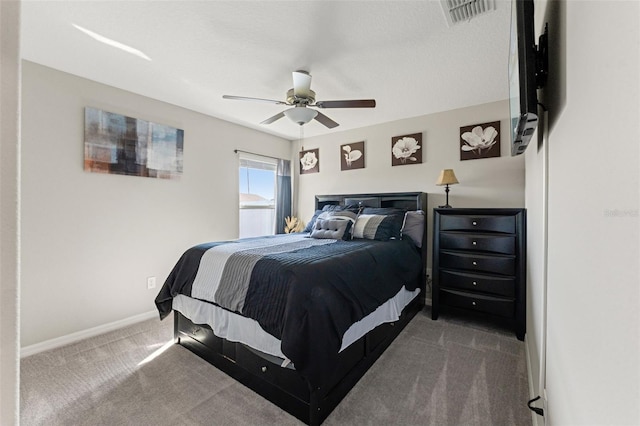 bedroom with visible vents, baseboards, a ceiling fan, and carpet flooring