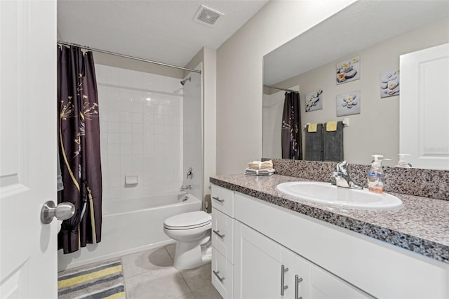 bathroom featuring visible vents, toilet, shower / bath combo, tile patterned floors, and vanity