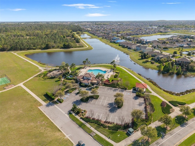 drone / aerial view with a water view