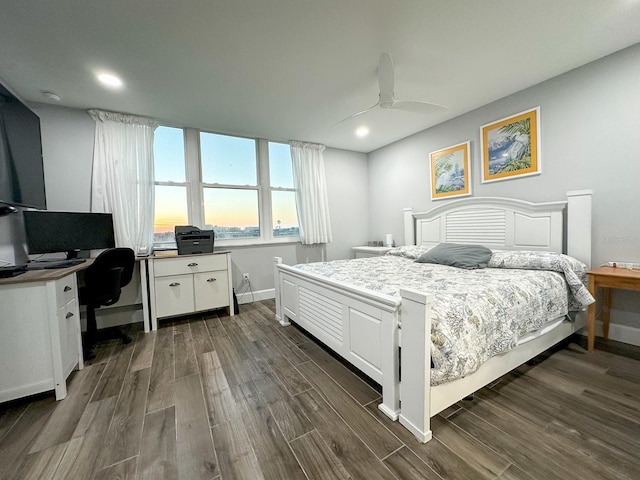 bedroom featuring recessed lighting, baseboards, ceiling fan, and dark wood-style flooring