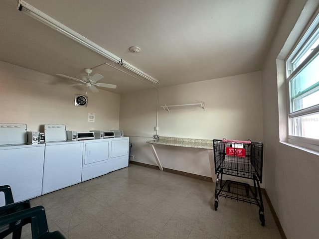 shared laundry area featuring visible vents, baseboards, independent washer and dryer, and ceiling fan