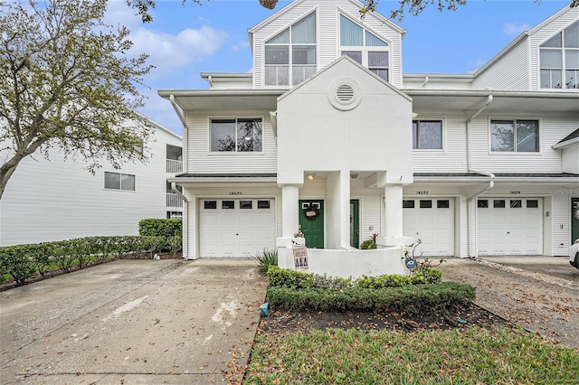 view of front of property with an attached garage and driveway