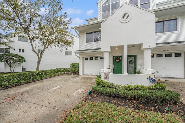 view of front of home featuring an attached garage and driveway