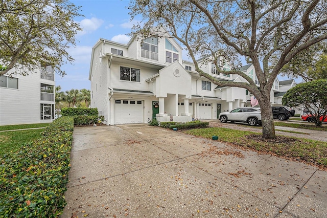 view of front of house featuring driveway and a garage