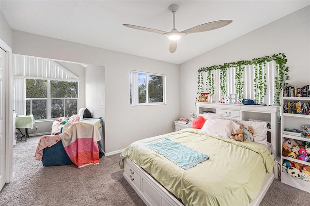 bedroom featuring lofted ceiling, carpet flooring, and ceiling fan