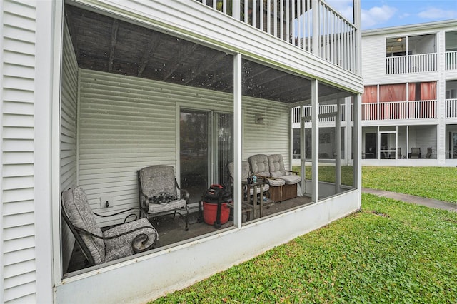 view of patio / terrace with a sunroom