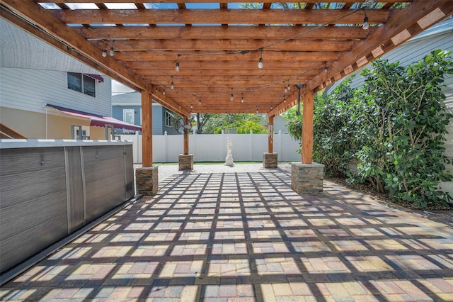 view of patio / terrace featuring fence and a pergola