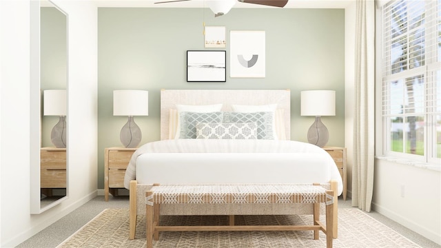 bedroom featuring baseboards, light colored carpet, and a ceiling fan