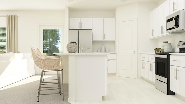 kitchen featuring stainless steel electric stove, white fridge with ice dispenser, a center island with sink, and white cabinetry