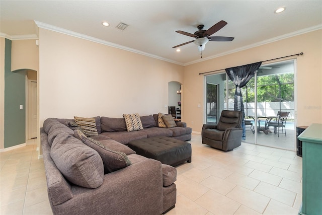 7581 Palmer Glen Cir, Sarasota, FL 34240 - living area featuring arched walkways, ceiling fan, light tile patterned flooring, ornamental molding, and recessed lighting