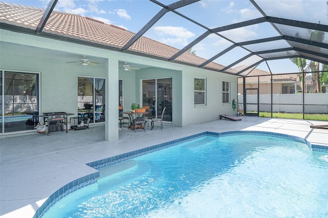 7581 Palmer Glen Cir, Sarasota, FL 34240 - view of swimming pool featuring a ceiling fan, a patio area, and a lanai