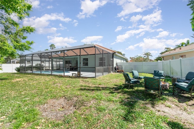 7581 Palmer Glen Cir, Sarasota, FL 34240 - view of yard with glass enclosure and a patio