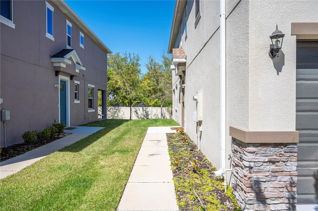 view of yard with fence