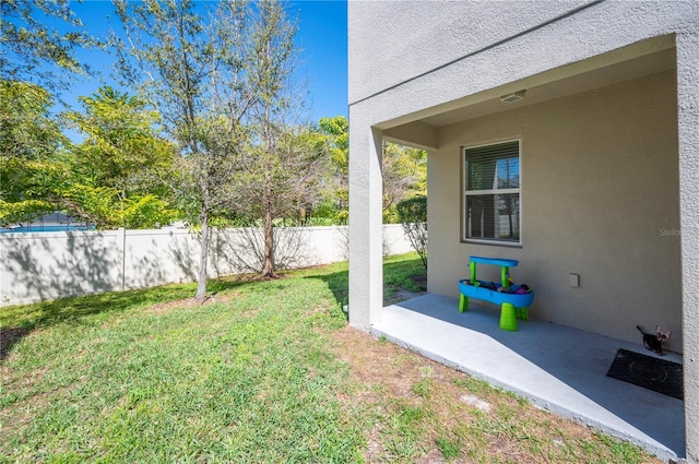 view of yard with fence