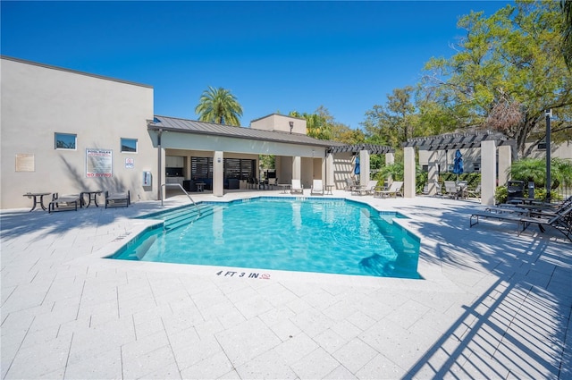 community pool featuring a patio and a pergola