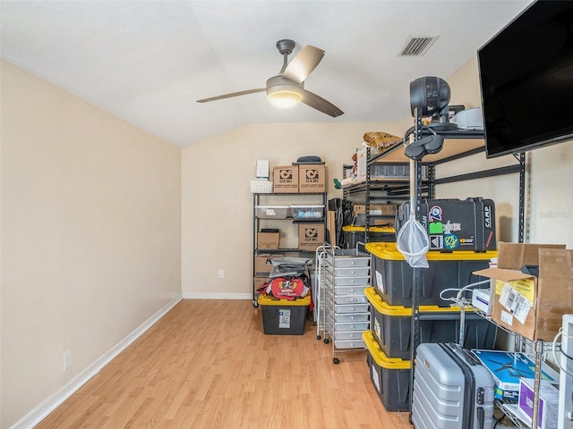 storage room with visible vents and a ceiling fan