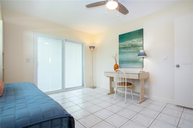 bedroom with light tile patterned flooring, a ceiling fan, and baseboards