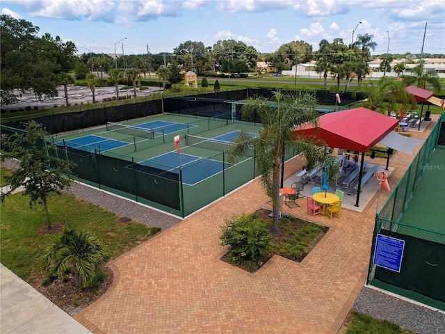 view of sport court with fence