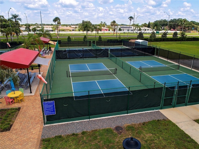 view of sport court with fence