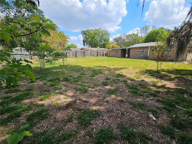 view of yard with fence