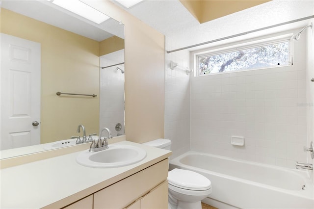 full bathroom featuring shower / bathing tub combination, toilet, and vanity