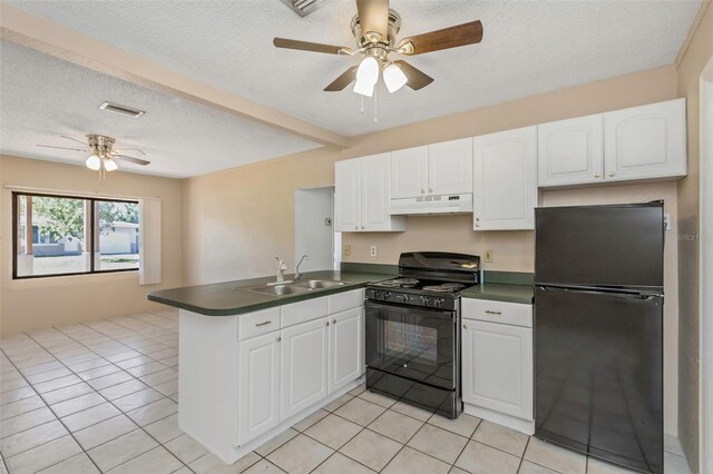 kitchen featuring a ceiling fan, visible vents, a peninsula, black appliances, and under cabinet range hood