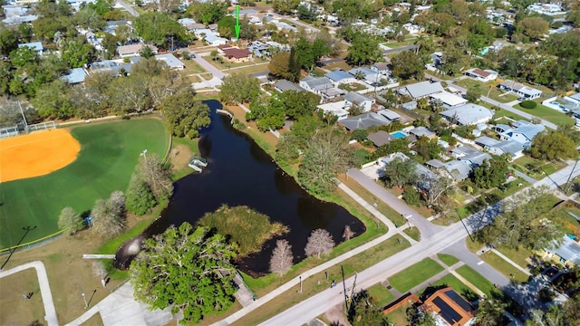 bird's eye view with a residential view and a water view