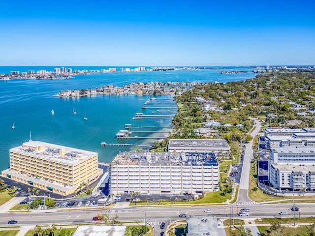 aerial view featuring a city view and a water view